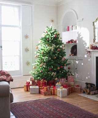 An image of a Christmas tree in a small apartment