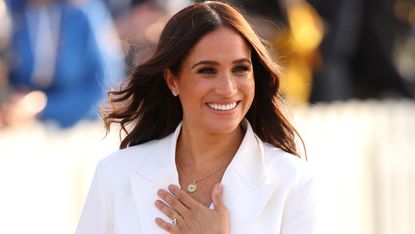 Meghan Markle in a white suit