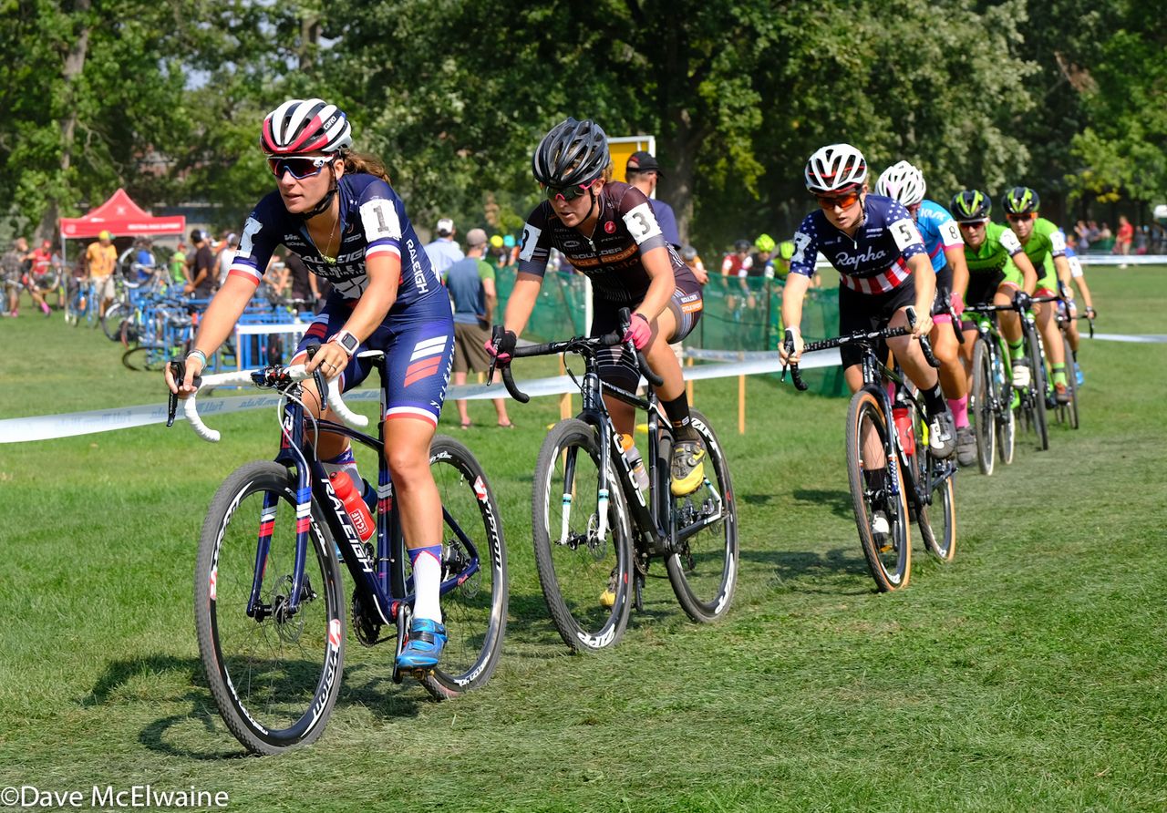 Caroline Mani (Raleigh Clement) leading the Elite Women onto the course. 106 Amanda Miller (Boulder Cycle Sport) rounding a tricky corner while in first place on the dusty course.