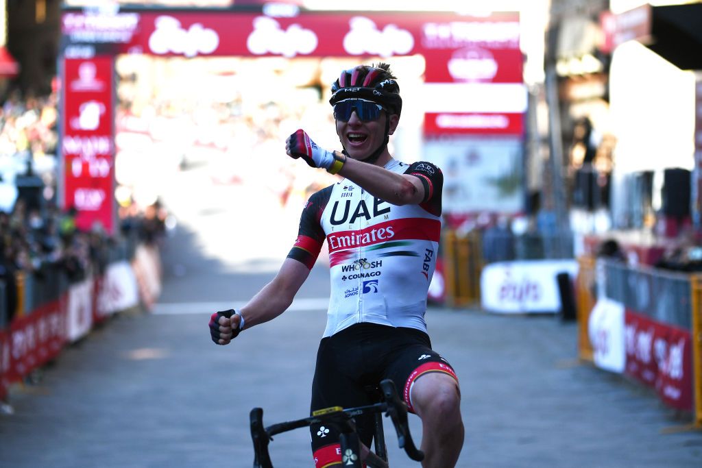 SIENA ITALY MARCH 05 Tadej Pogacar of Slovenia and UAE Team Emirates celebrates winning during the Eroica 16th Strade Bianche 2022 Mens Elite a 184km one day race from Siena to Siena Piazza del Campo 321m StradeBianche WorldTour on March 05 2022 in Siena Italy Photo by Tim de WaeleGetty Images