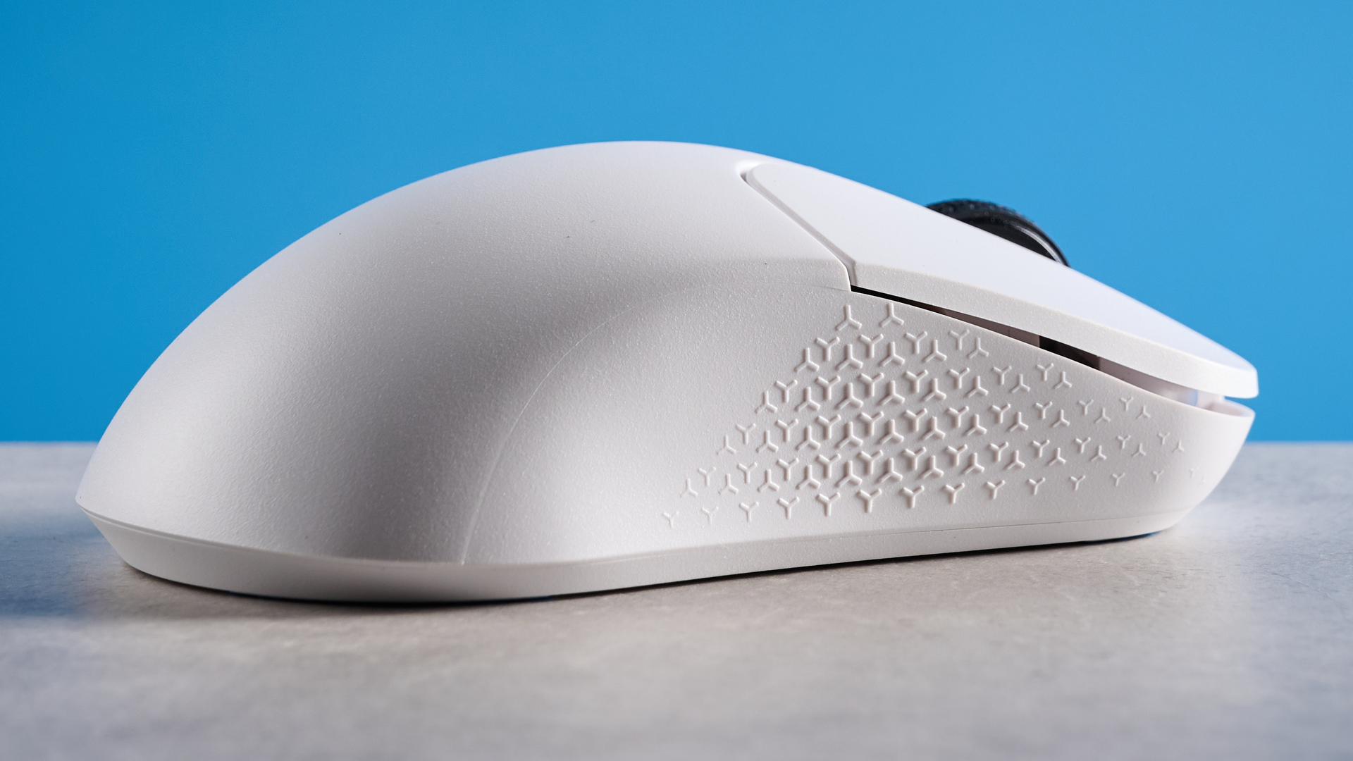 A white Keychron M3 Mini 8K gaming mouse