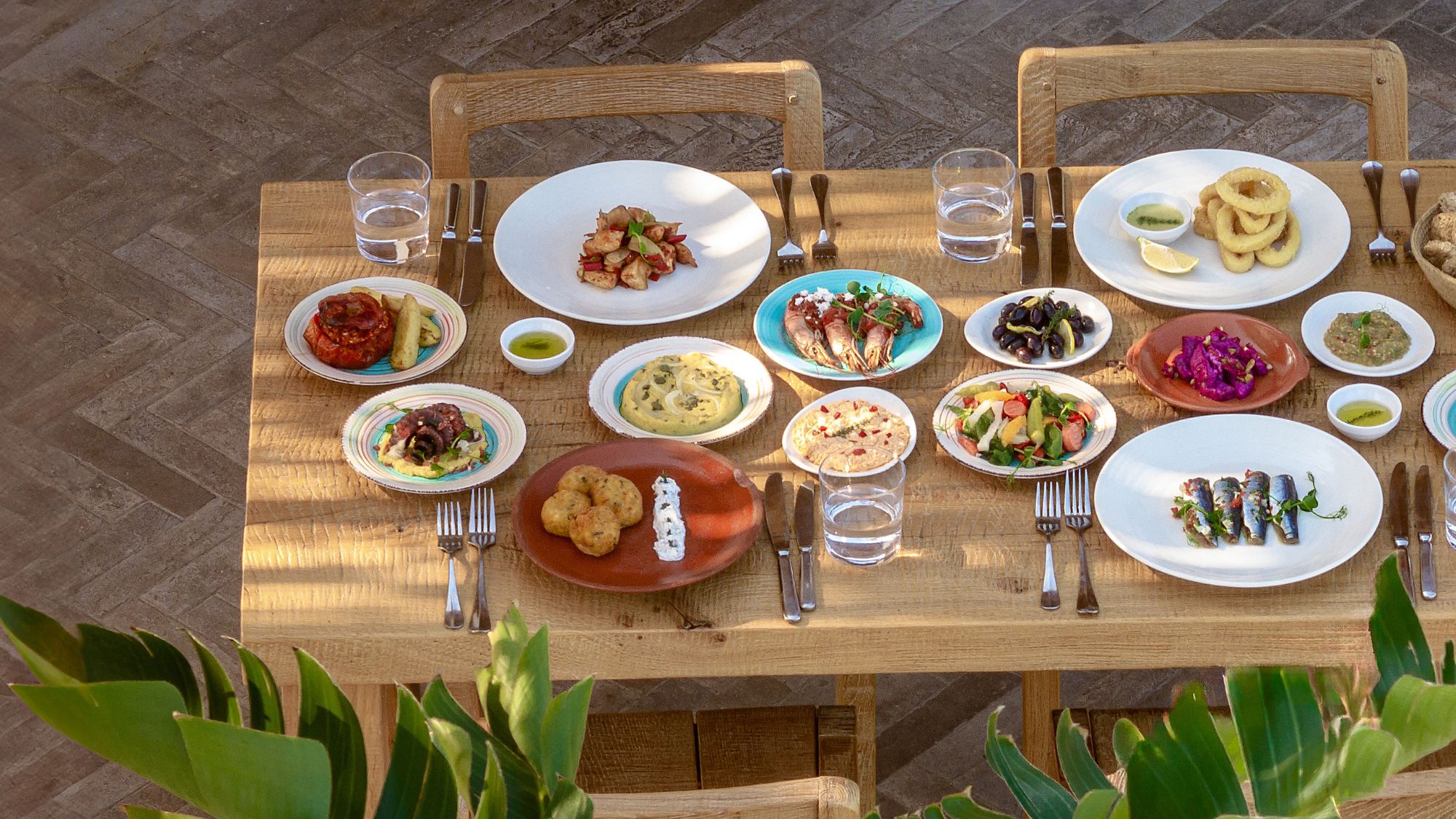 Grecotel Luxme Dama Dama Greek restaurant - table laid with meze