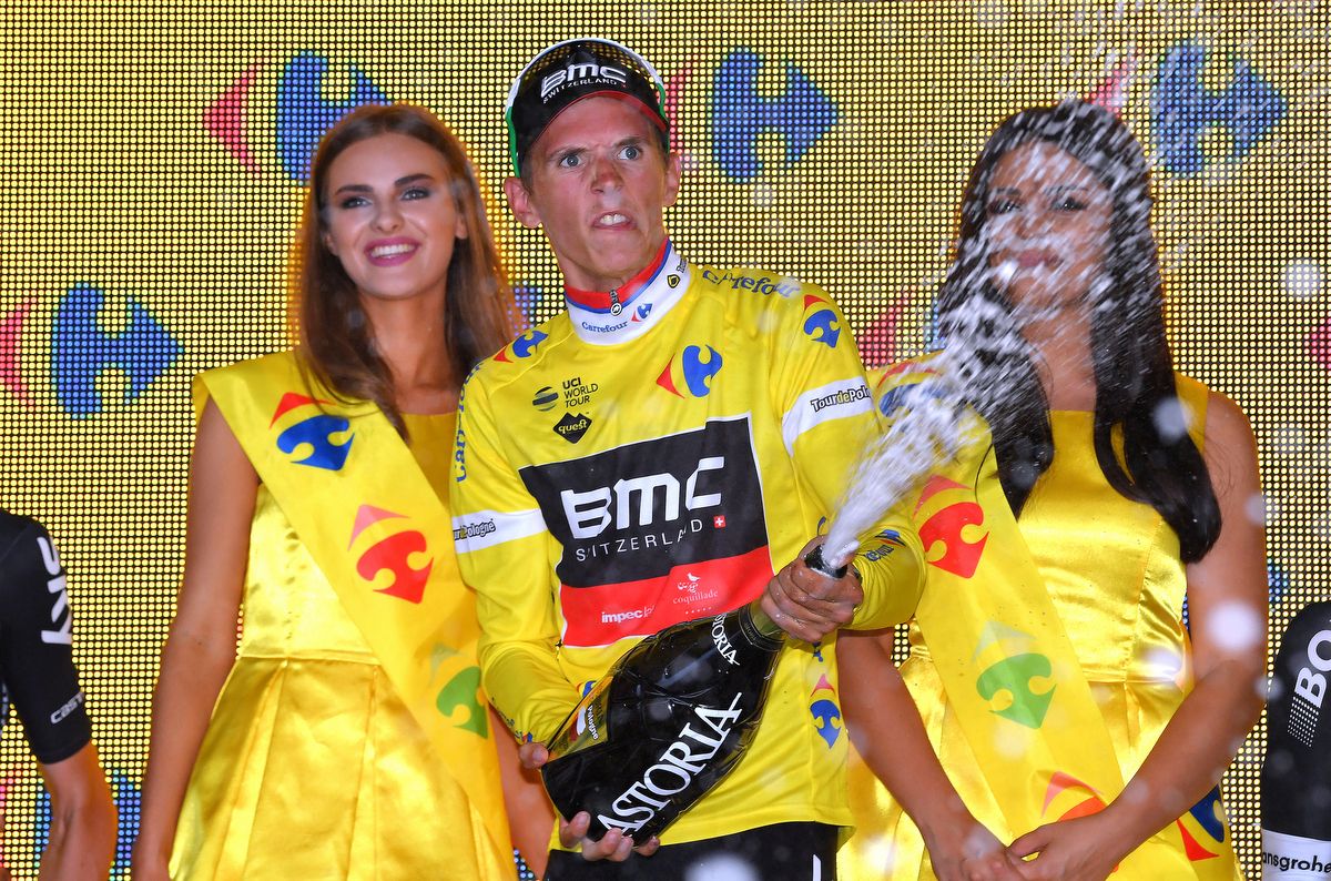 Dylan Teuns gets into the podium celebration
