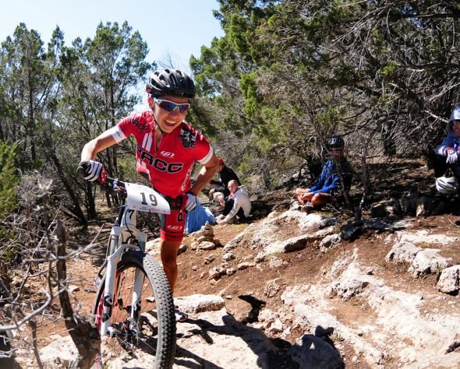 Lisa Uranga making a quick dismount on a technical climb