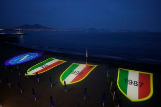 Napoli fans project their scudetto wins onto the sand