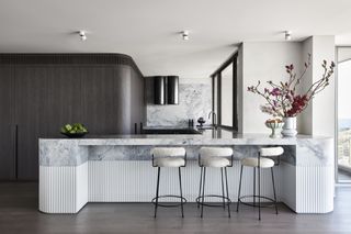 A kitchen with fluted island