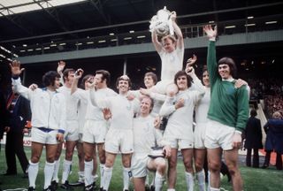 Leeds celebrate winning the FA Cup after victory over Arsenal