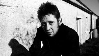 Shane MacGowan, bandleader of iconic punk group The Pogues, has died aged 65, his wife confirms