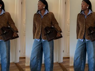 Fashion influencer Nnenna wearing wide-leg jeans, silver statement earrings, a striped button-down shirt, and a brown suede jacket and carrying a suede bag.