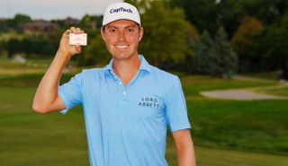 Ben Griffin holds his PGA Tour card