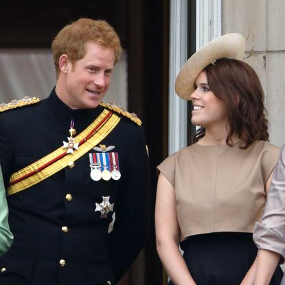 Prince Harry and Princess Eugenie stand on the balcony of Buckingham Palace during Trooping the Colour on June 13, 2015 in London, England. The ceremony is Queen Elizabeth II's annual birthday parade and dates back to the time of Charles II in the 17th Century, when the Colours of a regiment were used as a rallying point in battle. 