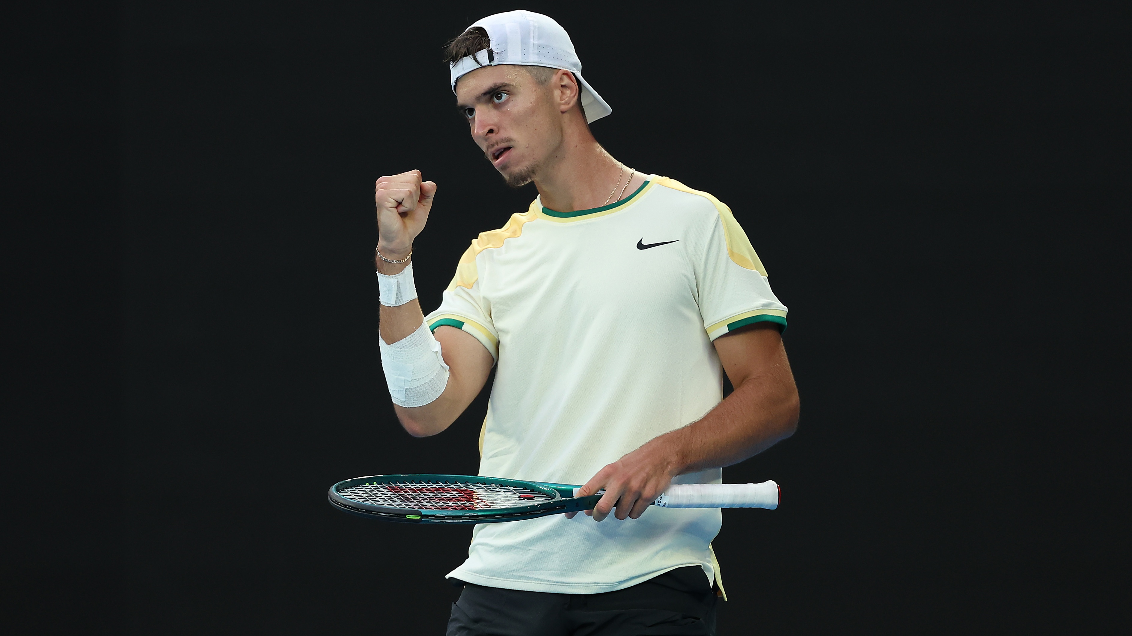 Dino Prizmic of Croatia celebrates a point in their round one singles match against Novak Djokovic of Serbia during day one of the 2024 Australian Open at Melbourne Park on January 14, 2024 in Melbourne, Australia.
