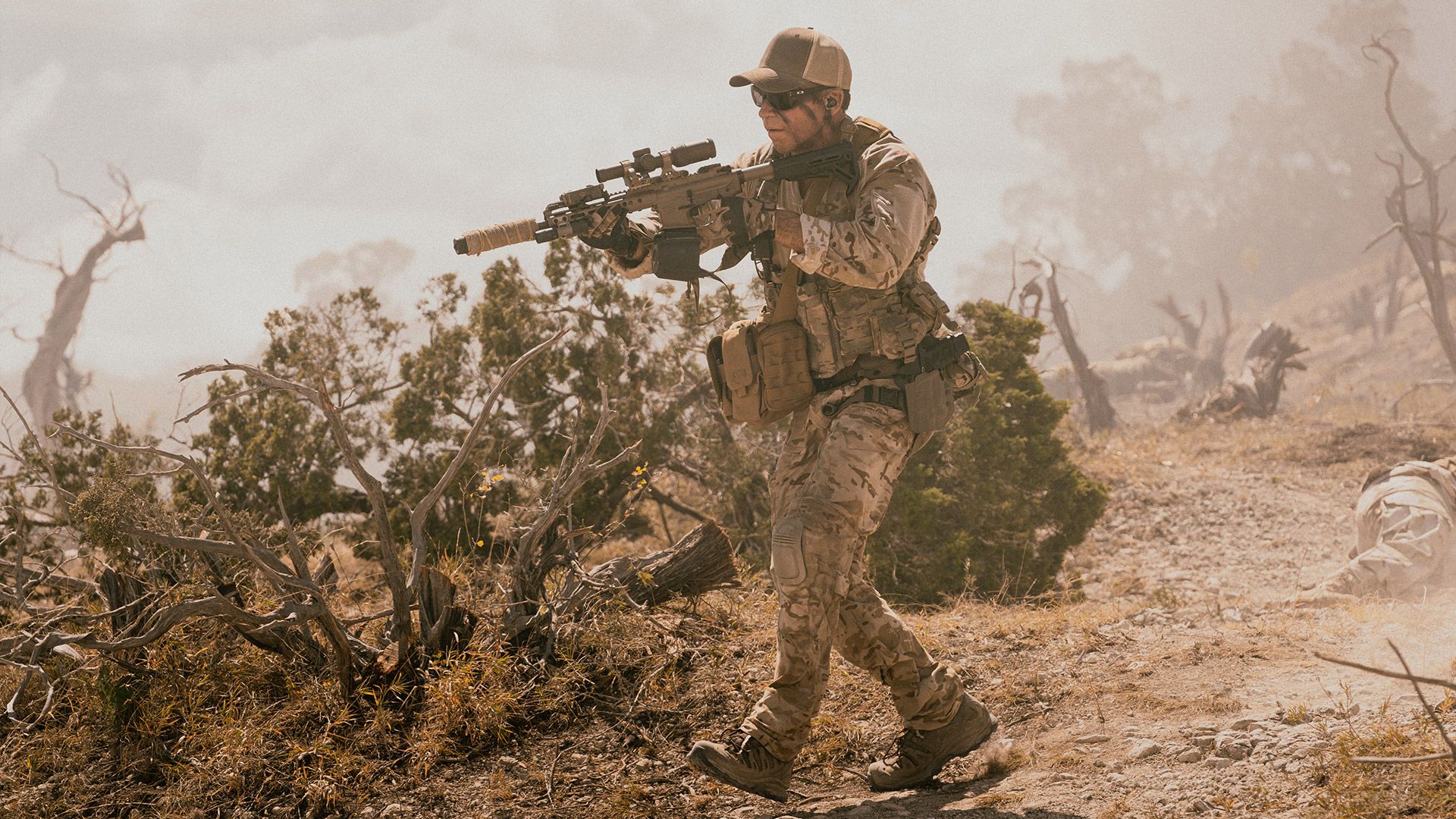 Cody walks with a gun in Lioness season 2