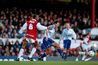 01 January 1997, London - FA Premiership - Arsenal v Middlesbrough - Ian Wright of Arsenal and Bryan Robson of Middlesbrough. (Photo by Mark Leech/Offside via Getty Images)