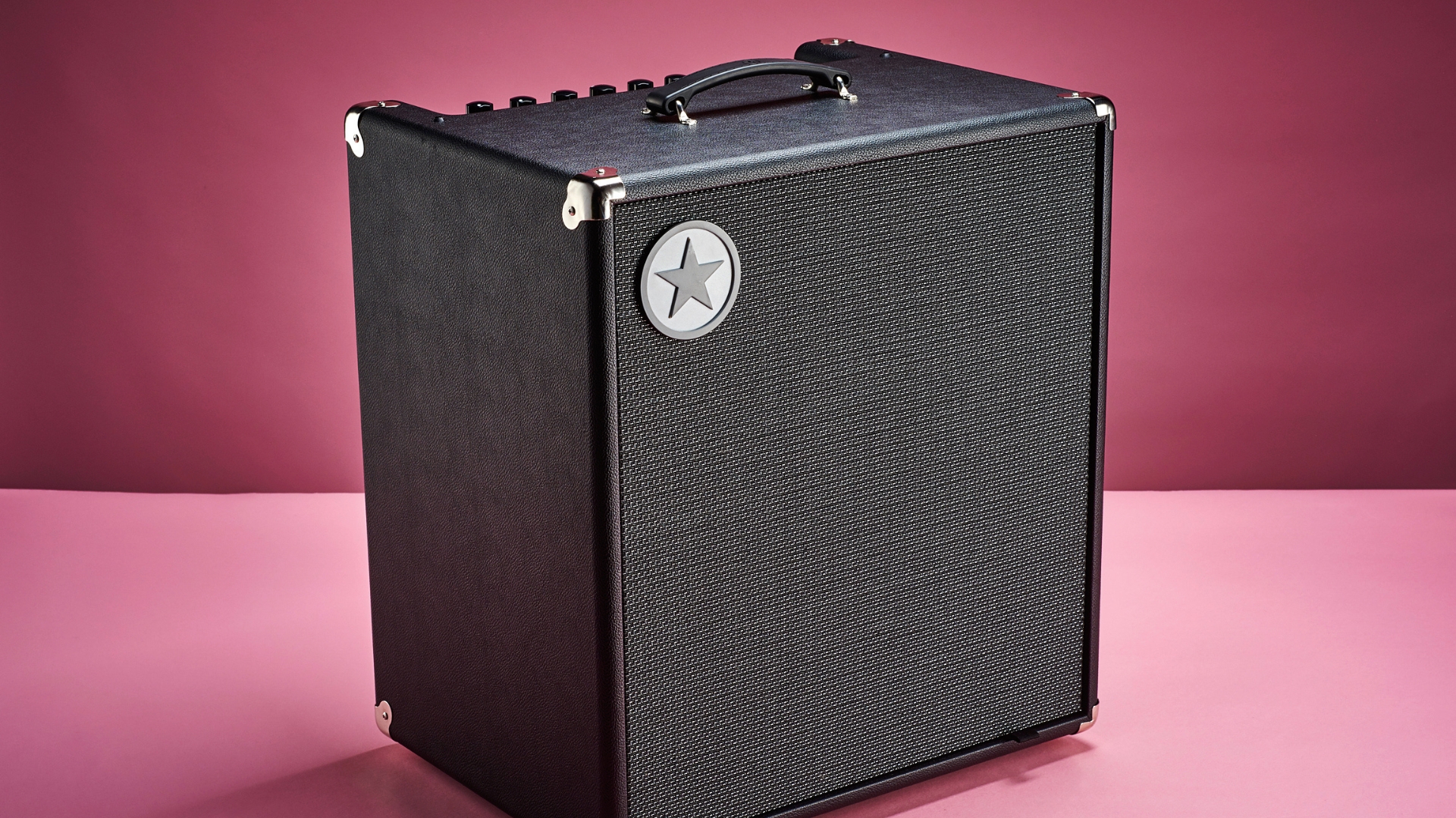 A Blackstar Unity 30 bass amp on a pink background