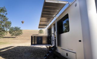 Luxury trailer with balcony and awning