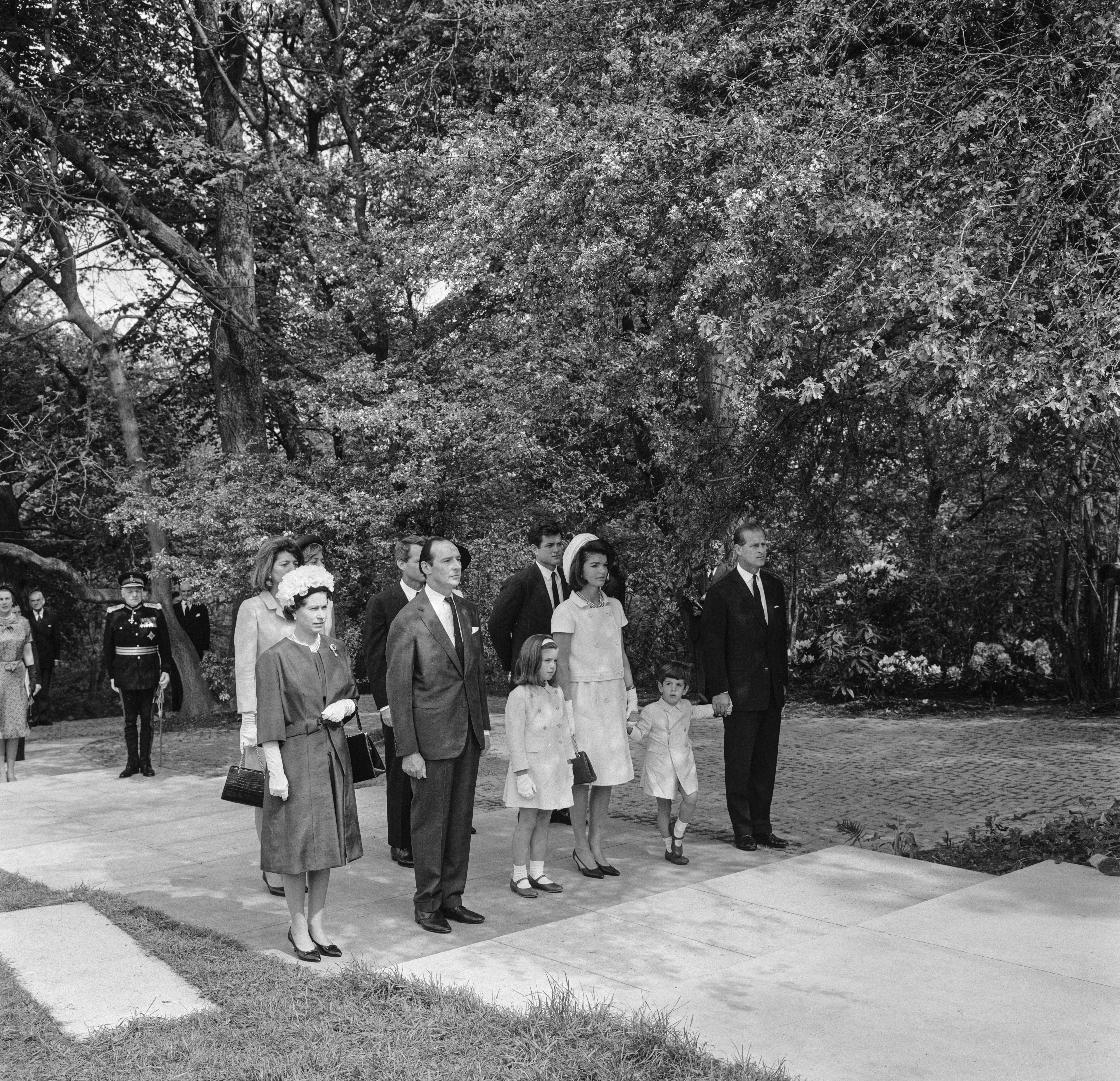 Jackie Kennedy, widow of assassinated US President John F. Kennedy, with her children Caroline and John F. Kennedy Jr., who held hands with Prince Philip at Runnymede for The Kennedy Memorial Stone ceremony May 14, 1965