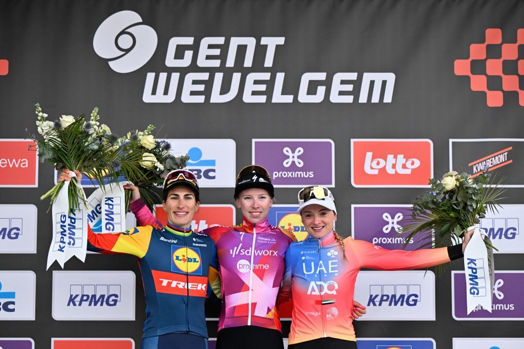 2024 podium (From L to R) Second-placed Italian Elisa Balsamo of Lidl-Trek, winner Dutch Lorena Wiebes of SD Worx - Protime and third-placed Italian Chiara Consonni of UAE Team ADQ celebrate on the podium after the Cycling World Tour Gent-Wevelgem women&#039;s 171,2 km from Ieper to Wevelgem, on March 24, 2024. (Photo by ERIC LALMAND / Belga / AFP) / Belgium OUT
