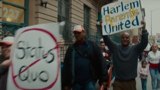 parents marching in Waiting for Superman