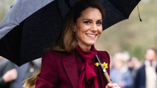 Catherine, Princess of Wales holds an umbrella as she arrives to visit Oriel Davies gallery on February 26, 2026 