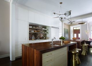 A waterfall style butcher block countertop