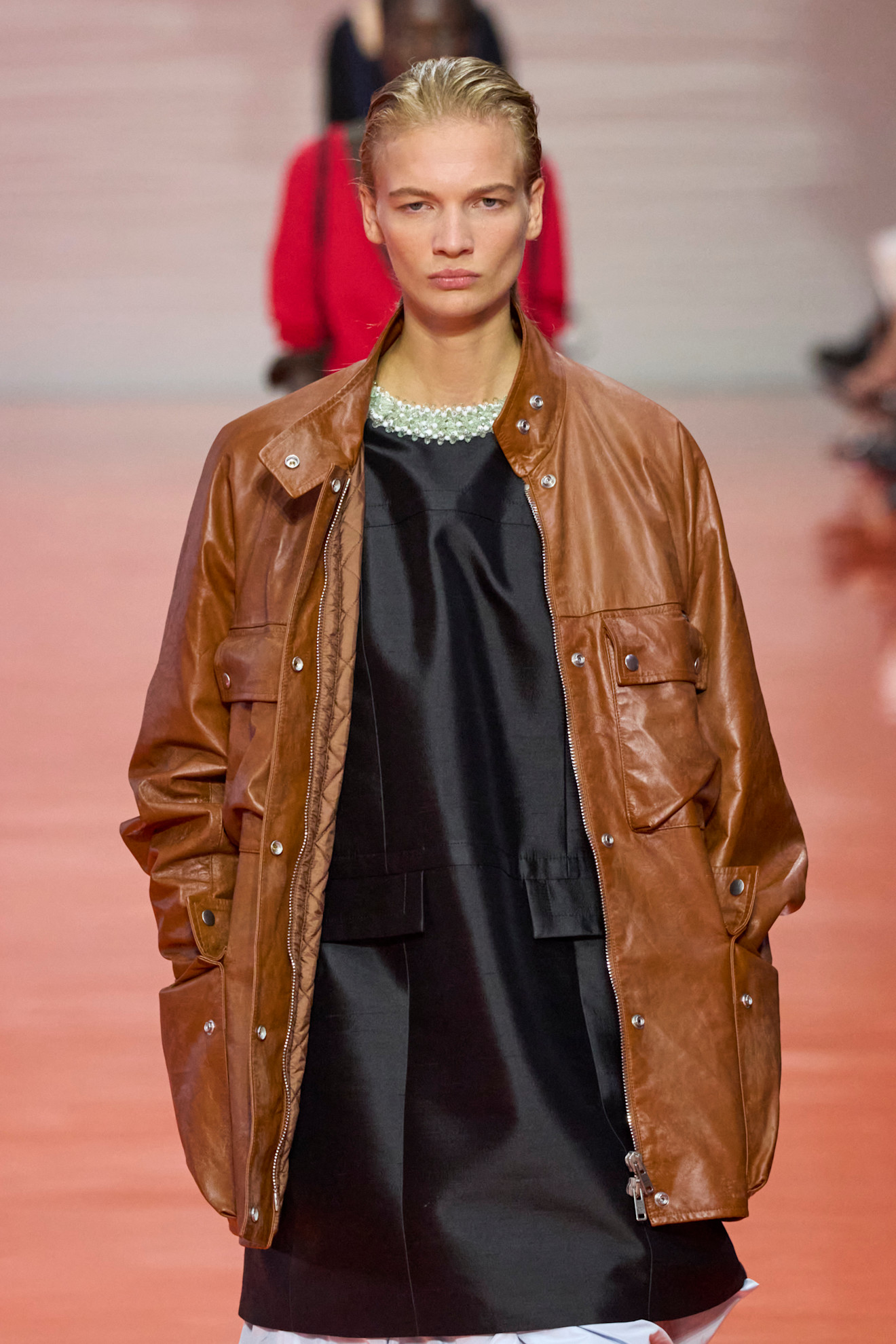 models wearing bead and gem embellished tops on the Prada spring 2026 runway