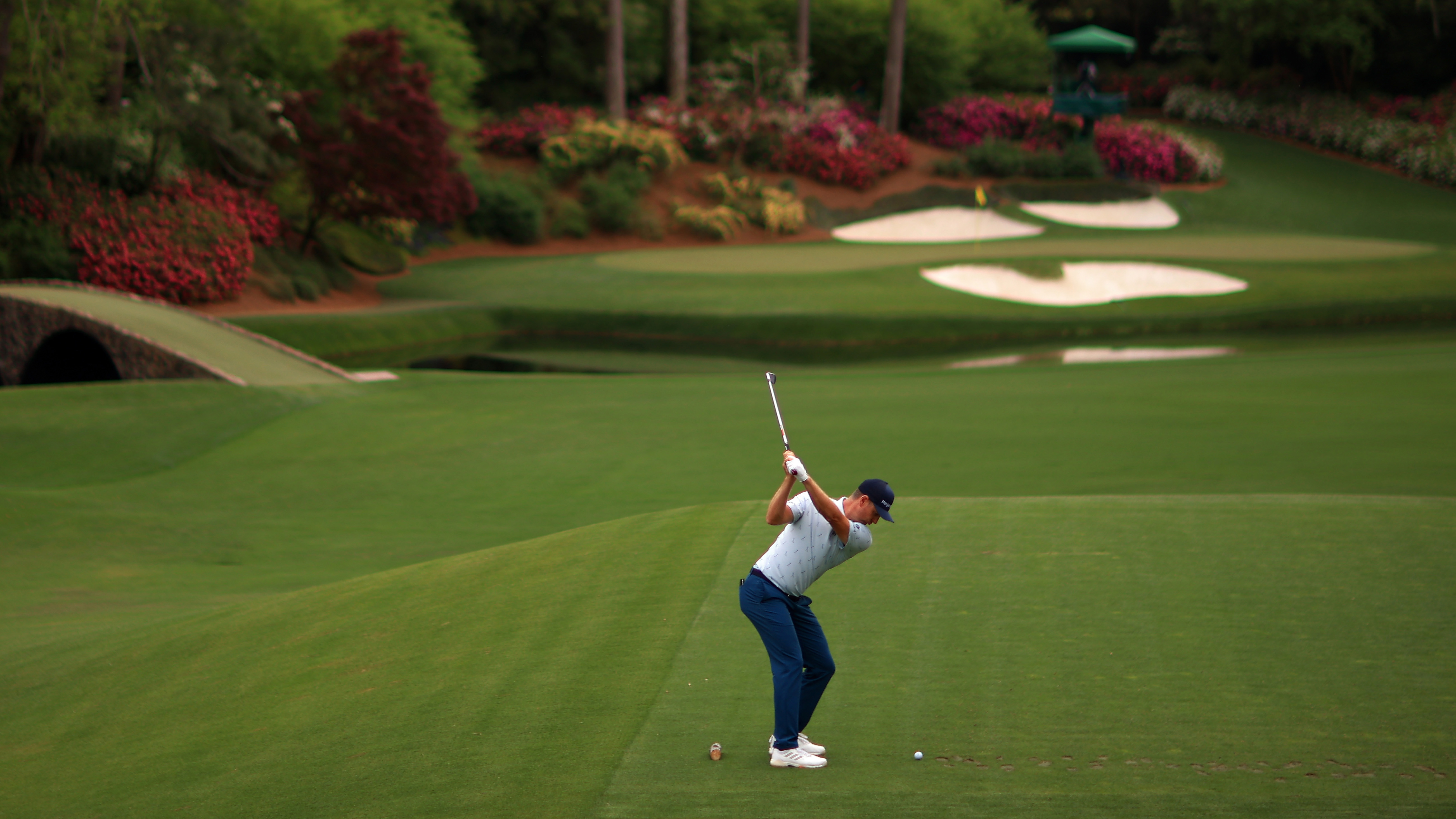 Justin Rose of England tees off on No. 12 on Thursday, April 8, 2021, at The Masters in Augusta, Ga.