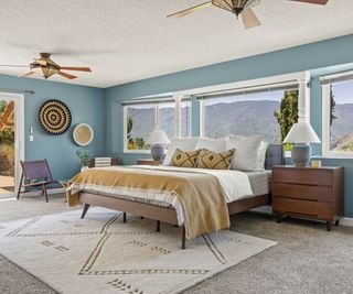 A blue master bedroom suite in Johnny Cash Home