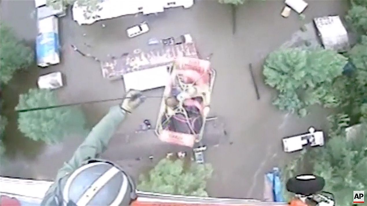 Rescuers airlift people from Louisiana flooding