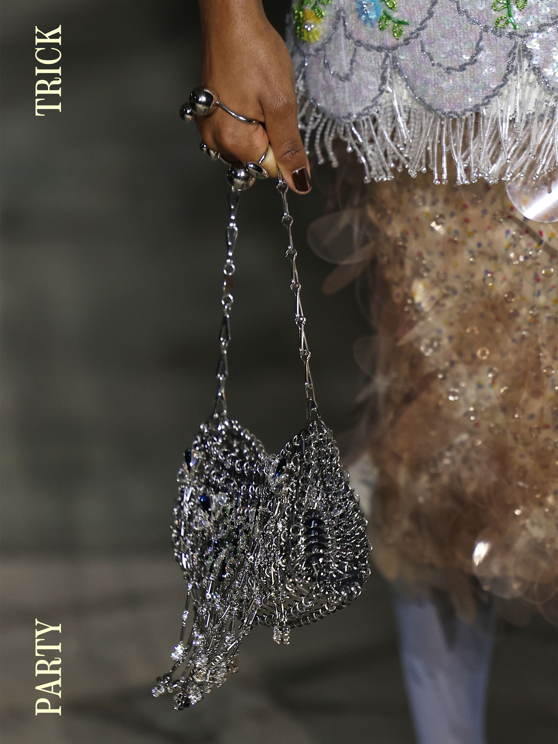 A Rabanne silver bag on the FW26 runway
