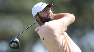 Scottie Scheffler tees off on the third hole during the final round of the 2024 Masters Tournament