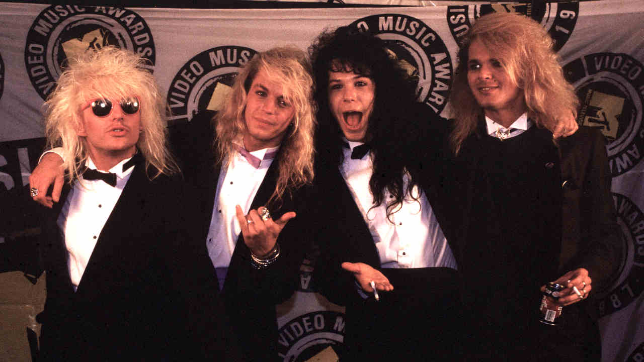 Poison wearing suits at the MTV Music Awards in 1987