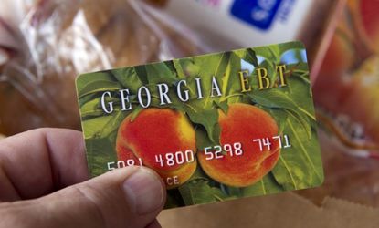 A food stamp card, made to resemble a credit card.
