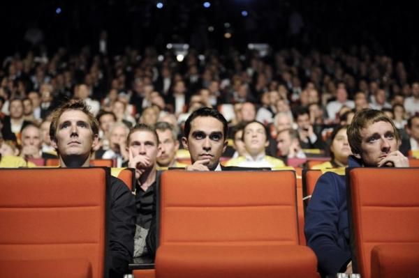 Andy Schleck, Alberto Contador and Bradley Wiggins watch as the route of the 2013 Tour de France is unveiled in Paris.