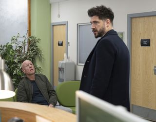 Adam Barlow visits John Perry in hospital.