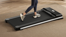 Person running on the UMAY Fitness Walking Pad