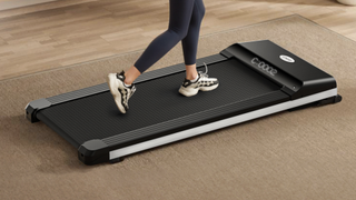 Person running on the UMAY Fitness Walking Pad