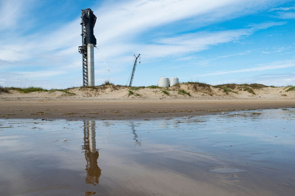 SpaceX's first orbital Starship SN20 is stacked atop its massive Super Heavy Booster 4 at the company's Starbase facility near Boca Chica Village in South Texas on Feb. 10, 2022.
