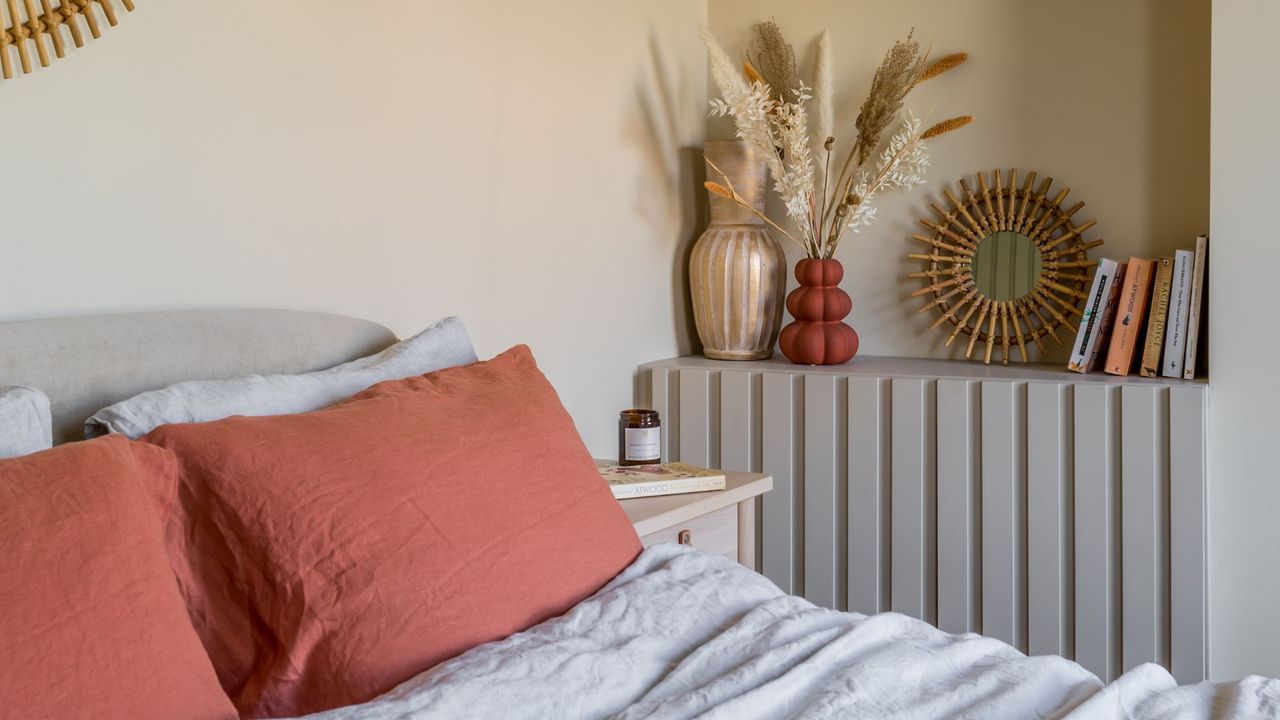 bedroom with dried flowers and decor on tongue and groove unit