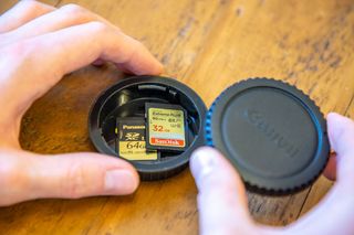 Keep SD cards safe in lens caps