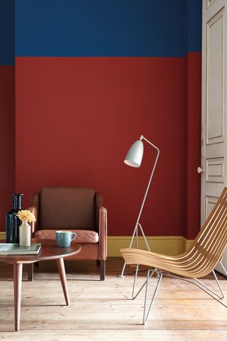 Living room with walls in Deep Space Blue & Bronze Red Absolute matt emulsion by Little Greene