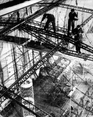 The frame of the Hindenburg takes shape at the Zeppelin Works in Friedrichshafen.