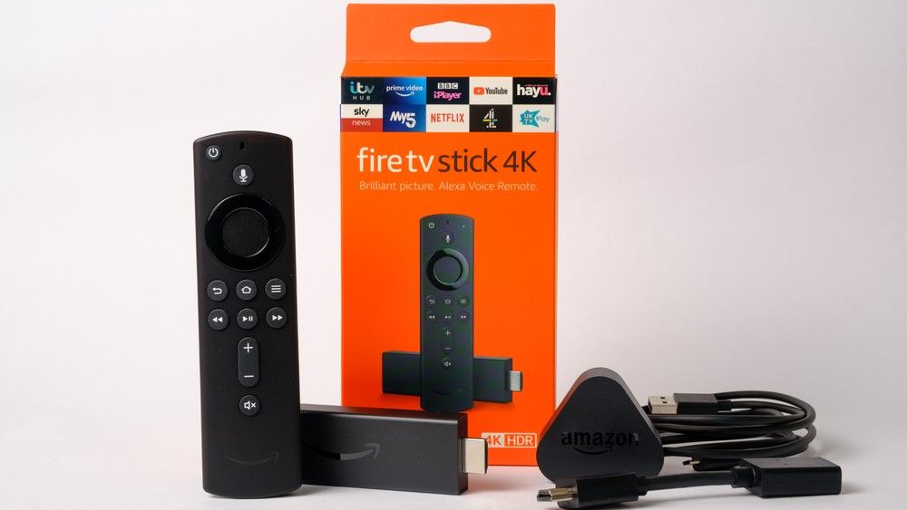 Contents of Amazon Fire TV Stick box, including remote, Fire Stick, plug and cables