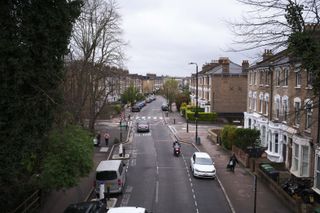 A street in London as seen from an elevated bridge