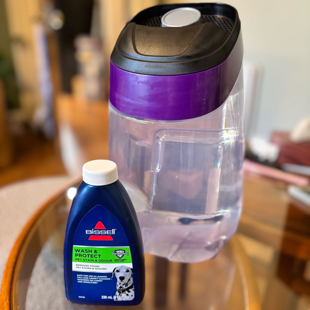 clean water tank of the bissell proheat 2x revolution pet pro with cleaning solution