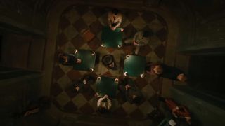 A group gathers for a seance in A Haunting in Venice