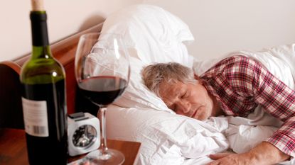 Man asleep after drinking alcohol