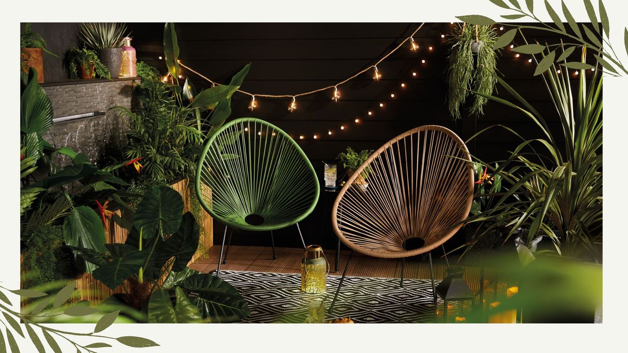 Garden shot at night time showing the new Aldi Acapulco chairs in green and beige under fairy lights