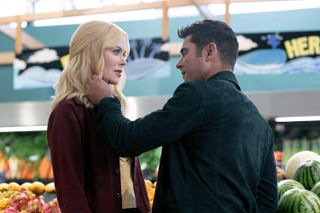 zac efron touches nicole kidman's face. in agrocery store in the movie a family affair