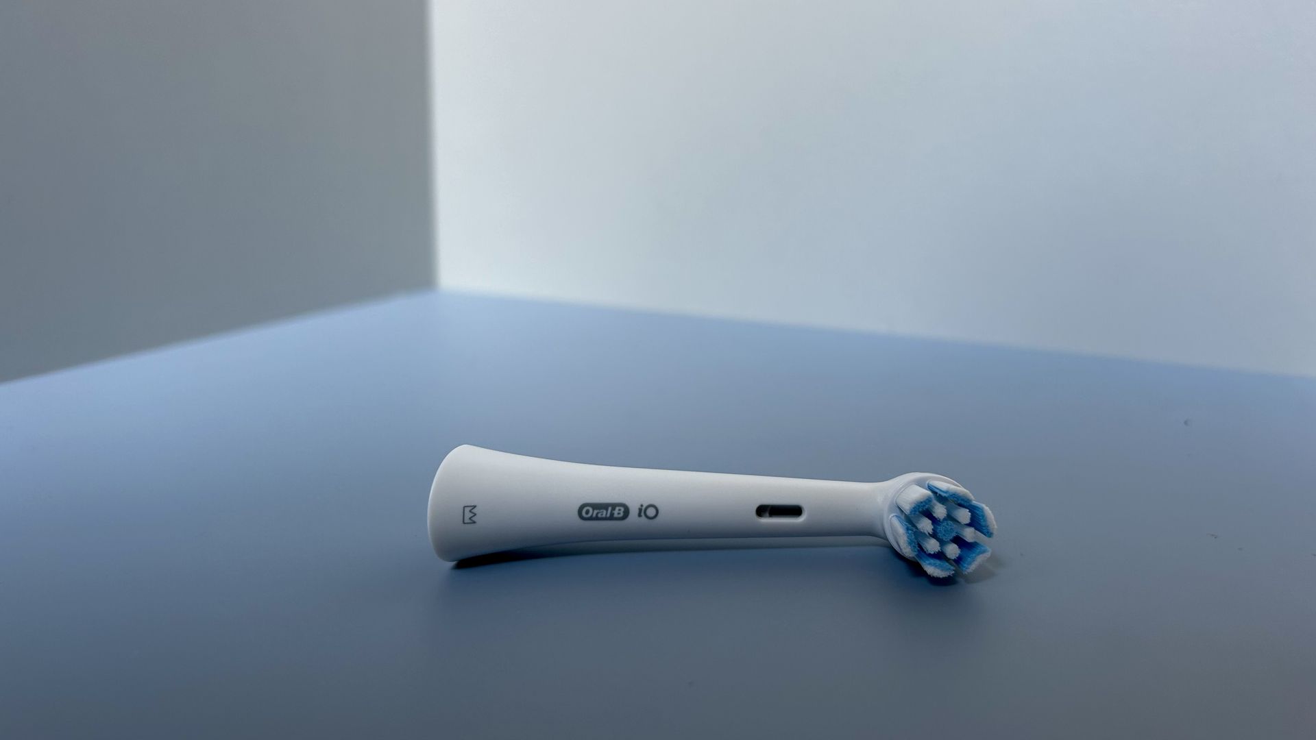 Close-up of the Oral-B ⁣iO2 electric toothbrush head.